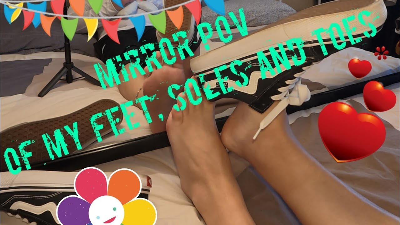 Mirror POV of bare feet soles and toes, pulling off my VANS and rubbing my feet