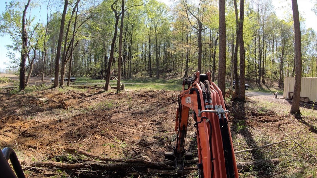 Clearing Trees & Repairing a Washout with Kubota KX040