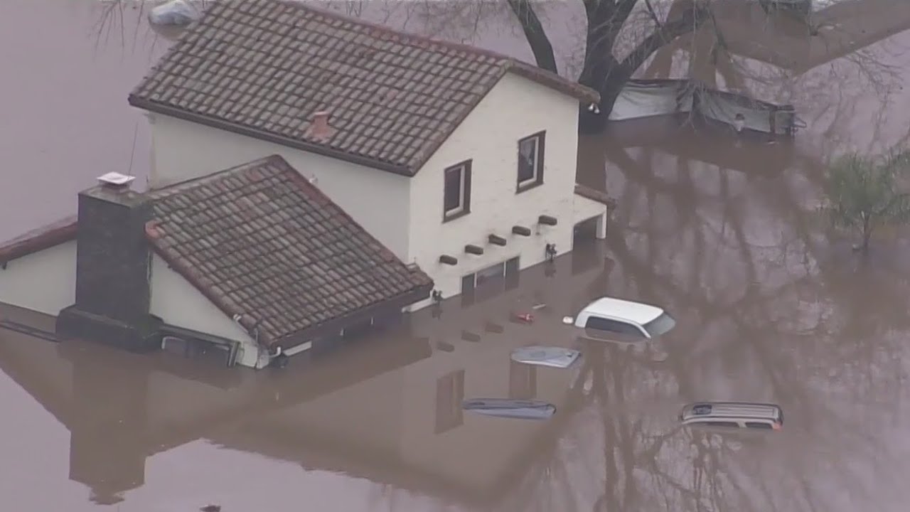 Aerial footage of flooding that shut down Hwy 101 in Gilroy, submerging nearby homes