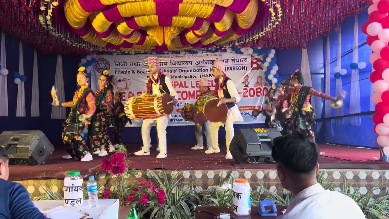 Performing in Municipal Level Cultural Dance Competition 9-12, organized by PABSON Birtamode