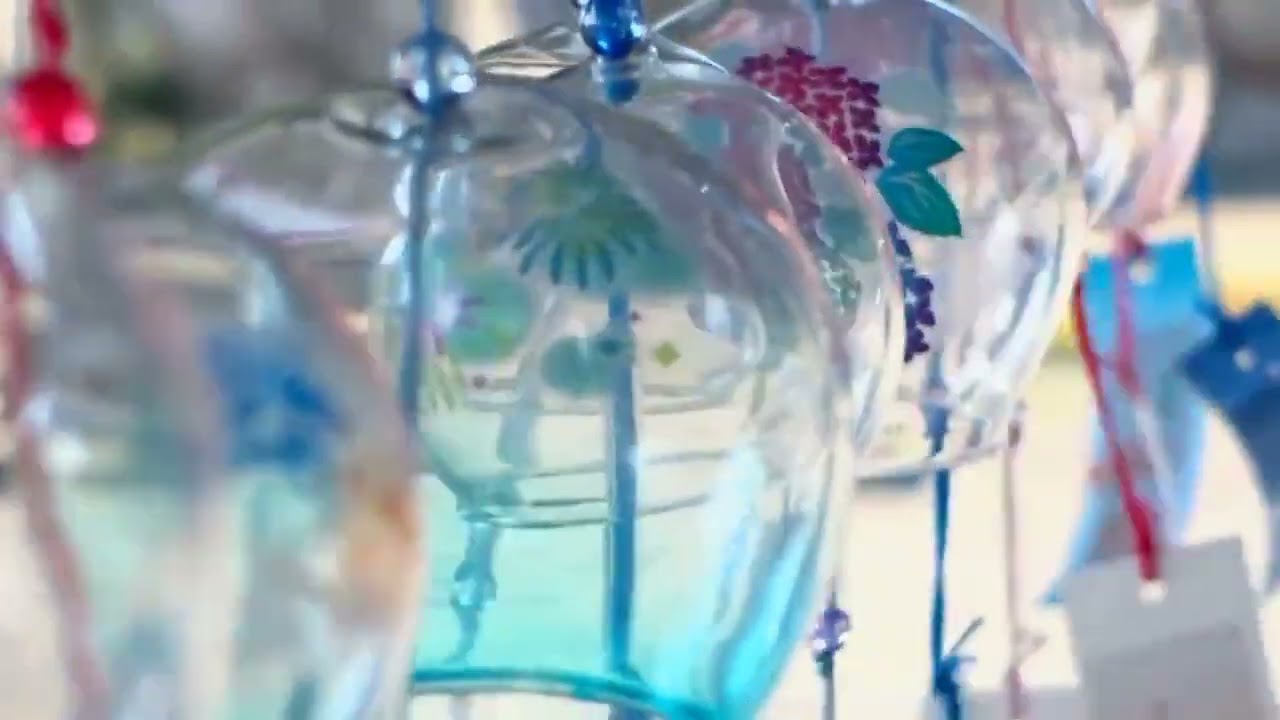 Tinkling Sound Of Several Glass Wind Chimes Blowing In The Wind