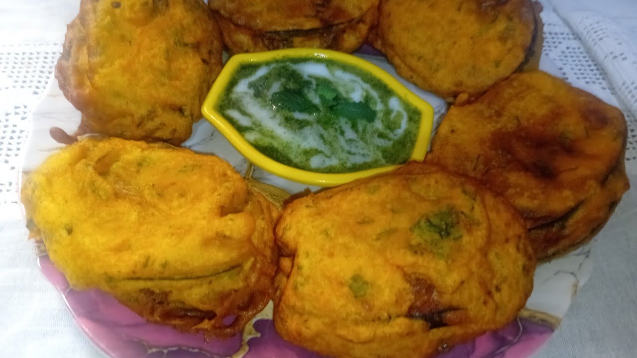 Double decker baingan pakoda recipe plz subscribe my channel ( brinjal pakora)by kanwal shoaib