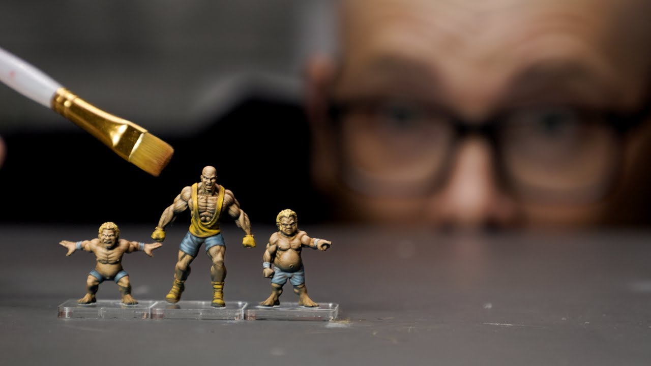 painting some vibrant Rumbleslam wrestlers