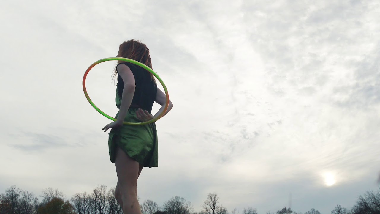 Hoop manipulation mini hoop dance