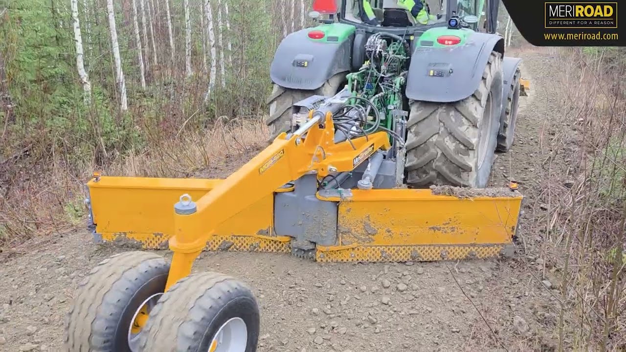 Forest road maintenance with tractor mounted MeriRoad equipment in Finland.