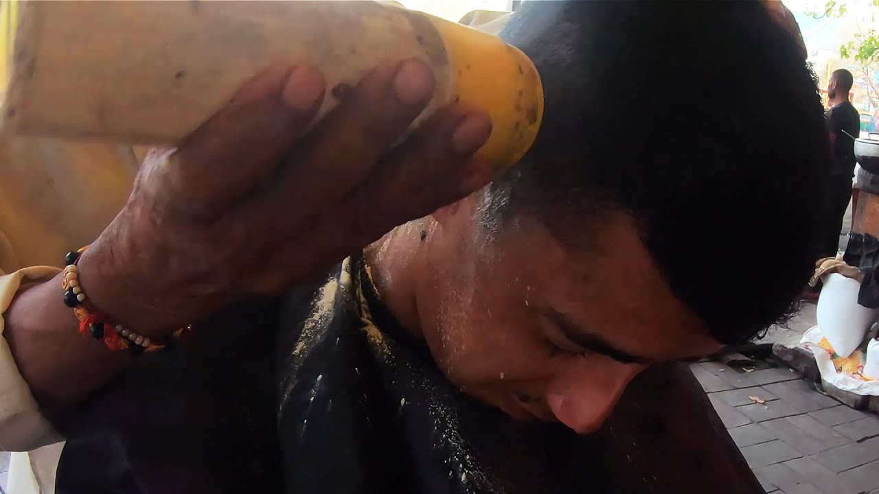 حلقت شعري في شوارع الهند وجربت المساج 🇮🇳