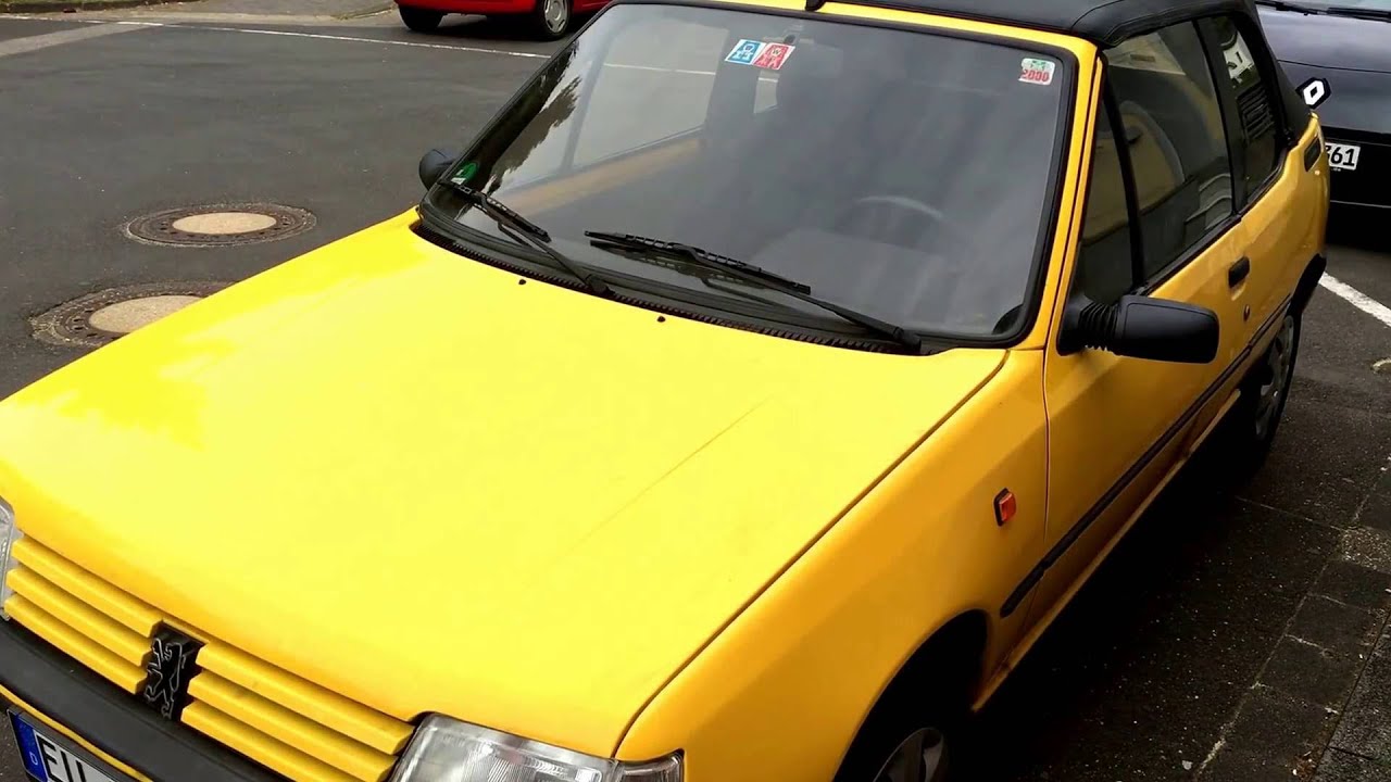 How to open and close the roof top of a Peugeot 205