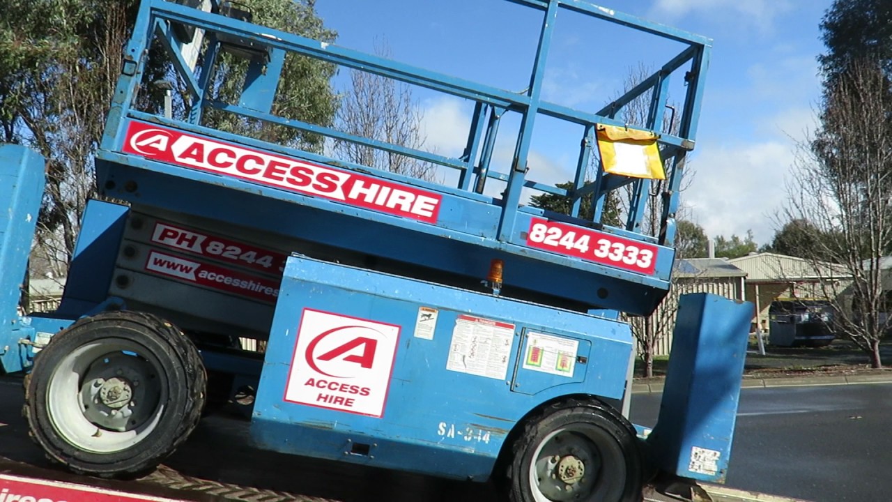 Loading a scissor-lift onto a flatbed truck!