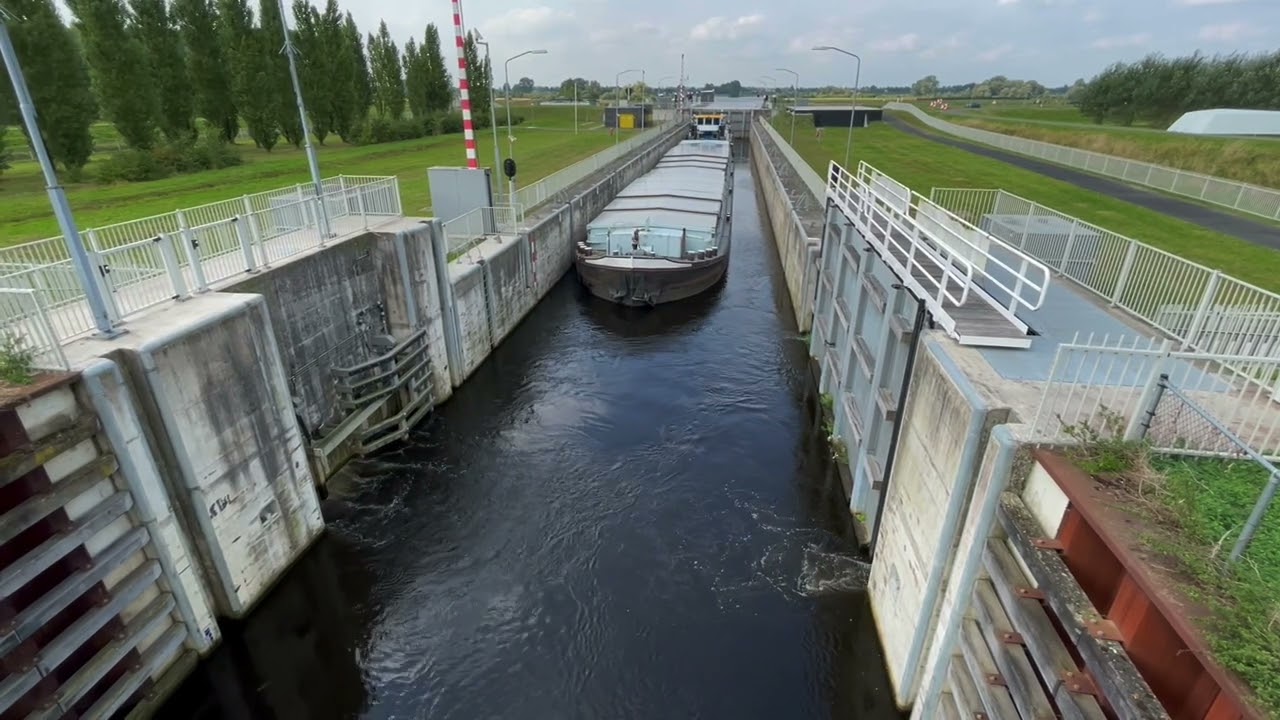 Ship exiting Empel lock (Sluis Empel), North Brabant, Netherlands (no sound)