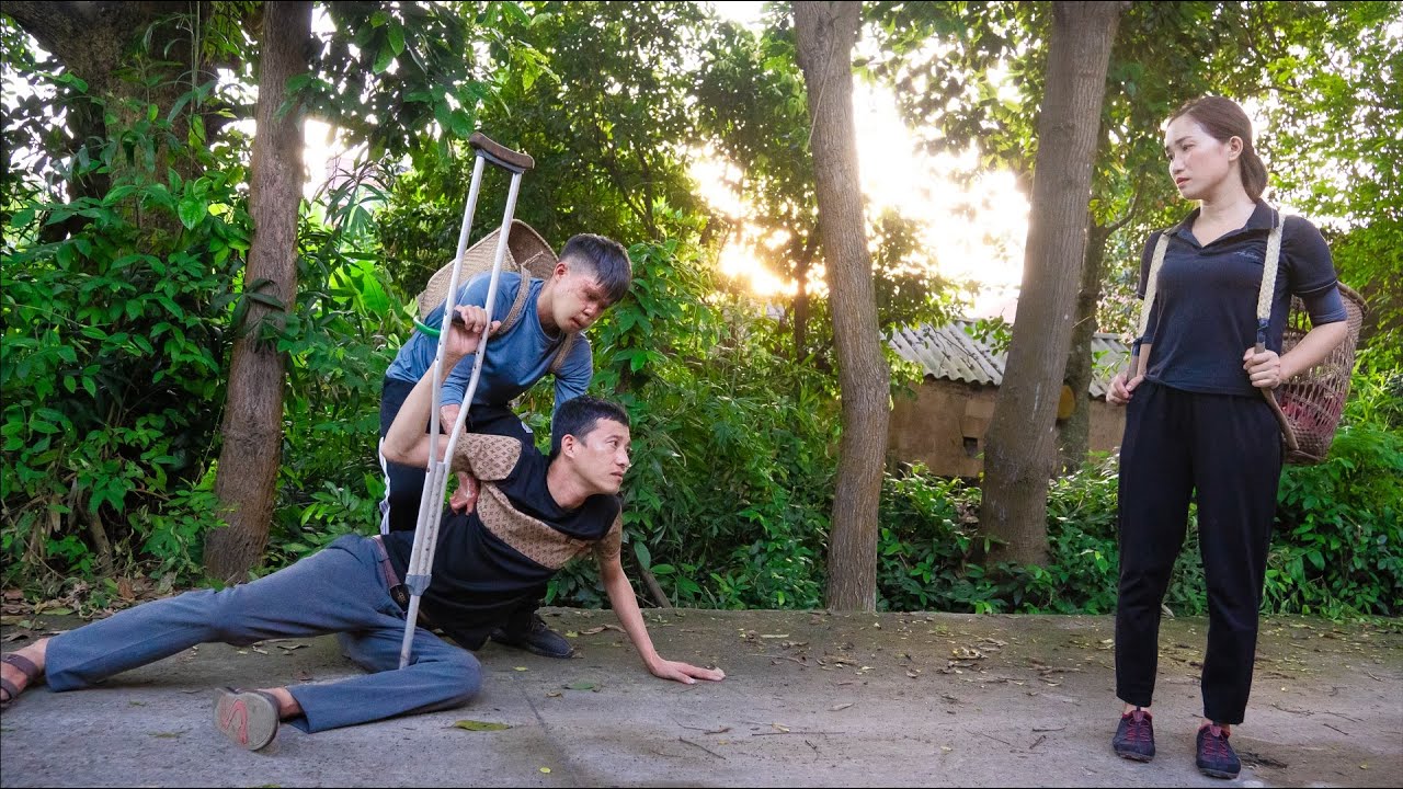 GRIEF: The kind man helplessly watched Ly Thi Hoa leave his arms...
