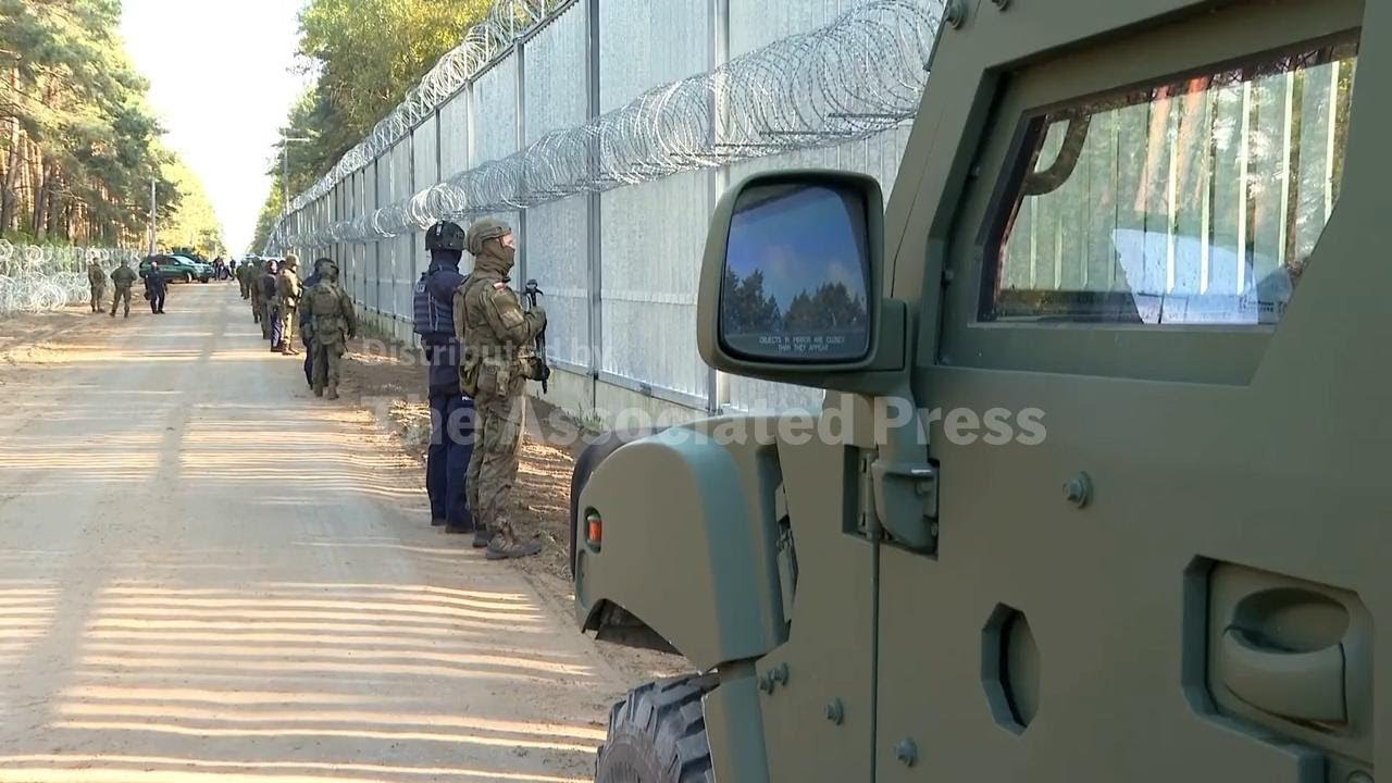 Media given rare access in Poland to heavily fortified zone along border with Belarus
