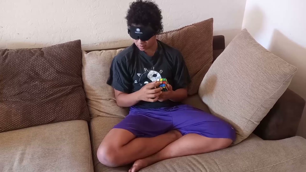 SOLVING RUBIK'S CUBE WHILE BLINDFOLDED