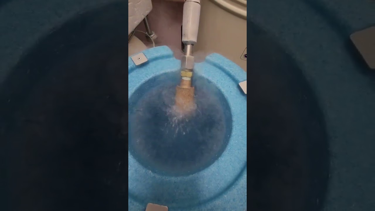 How do we safely freeze embryos with liquid nitrogen in the IVF lab?