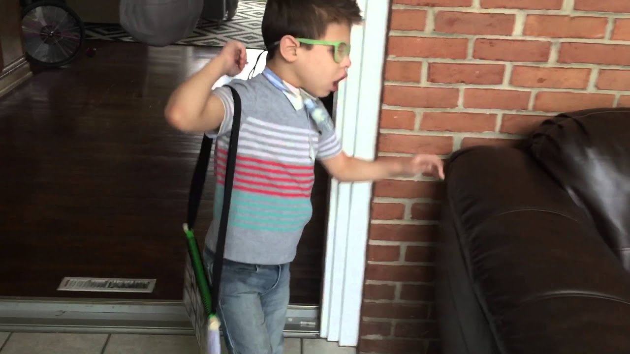 Jayden bringing his PODD to dad to talk!
