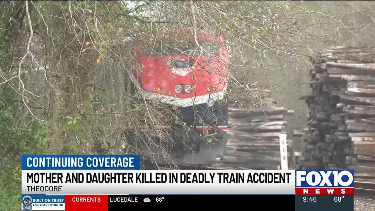 Woman, child killed in train-vehicle crash, authorities say