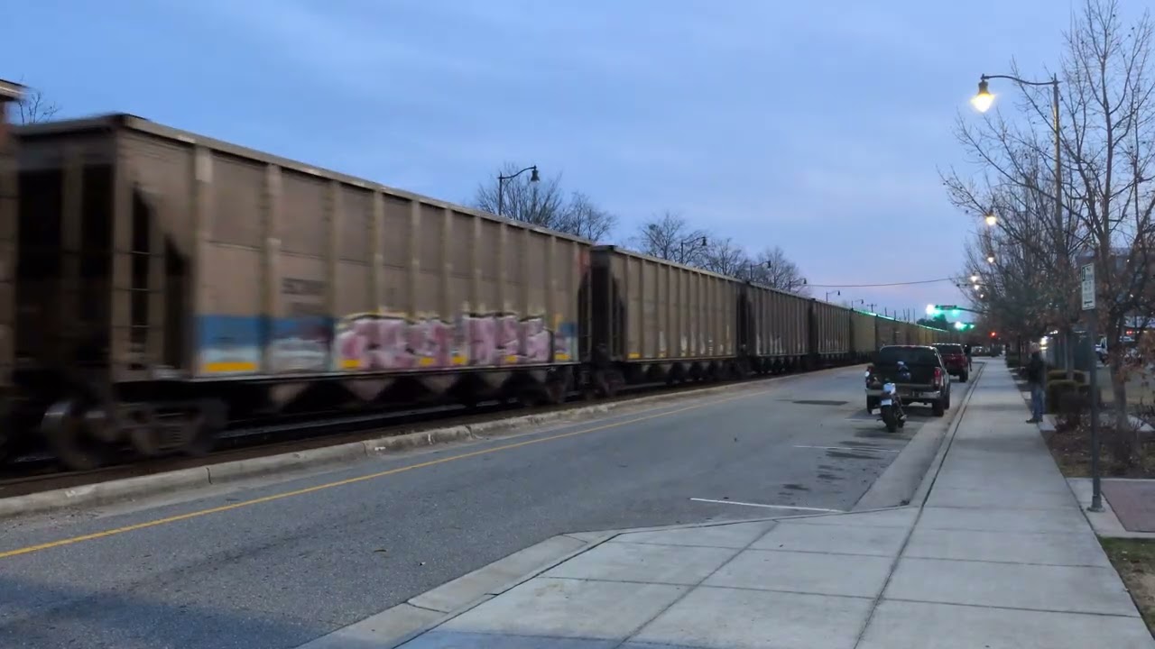 CSX 4707 leads a north bound empty coal train through Fayetteville with CSX 7002 and CSX 4701as DPUs