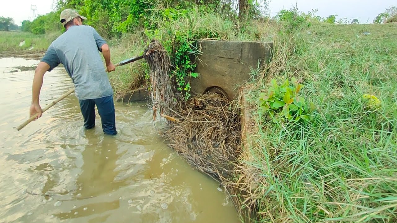 Unclogged Culvert Drain - Removal Debris Clogged Culvert Drain