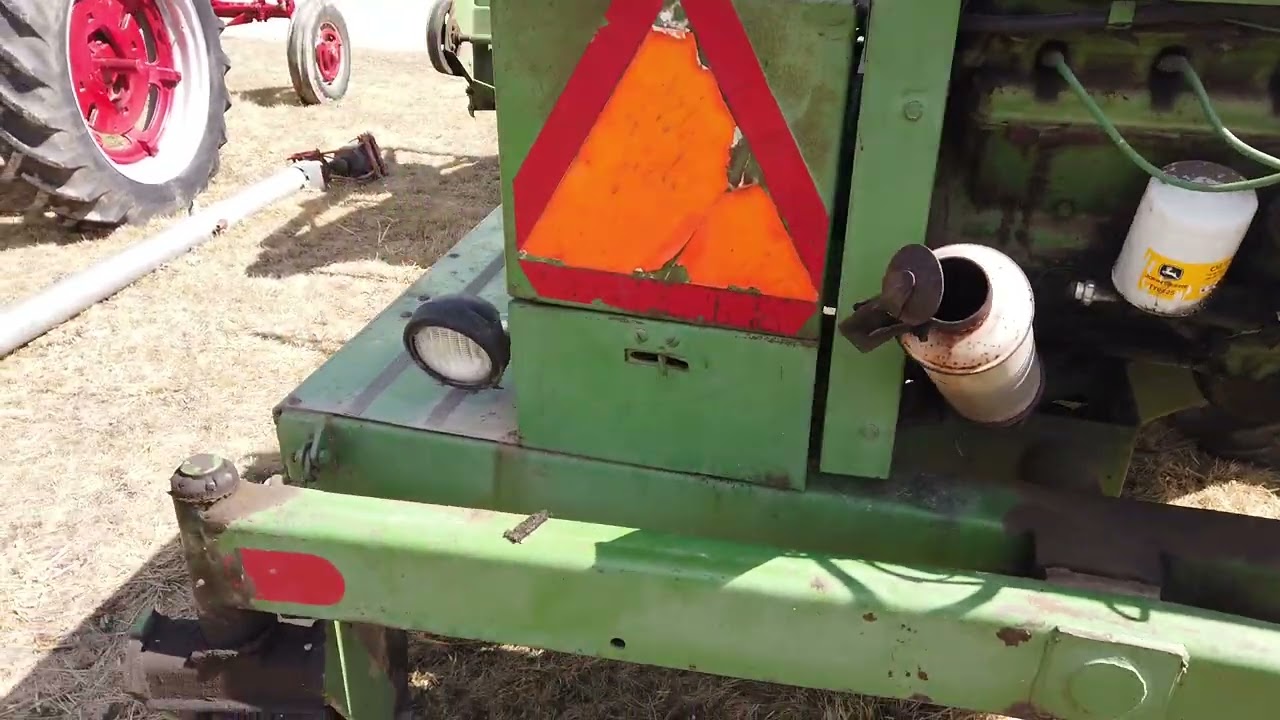 John Deere 800 Swather, with head