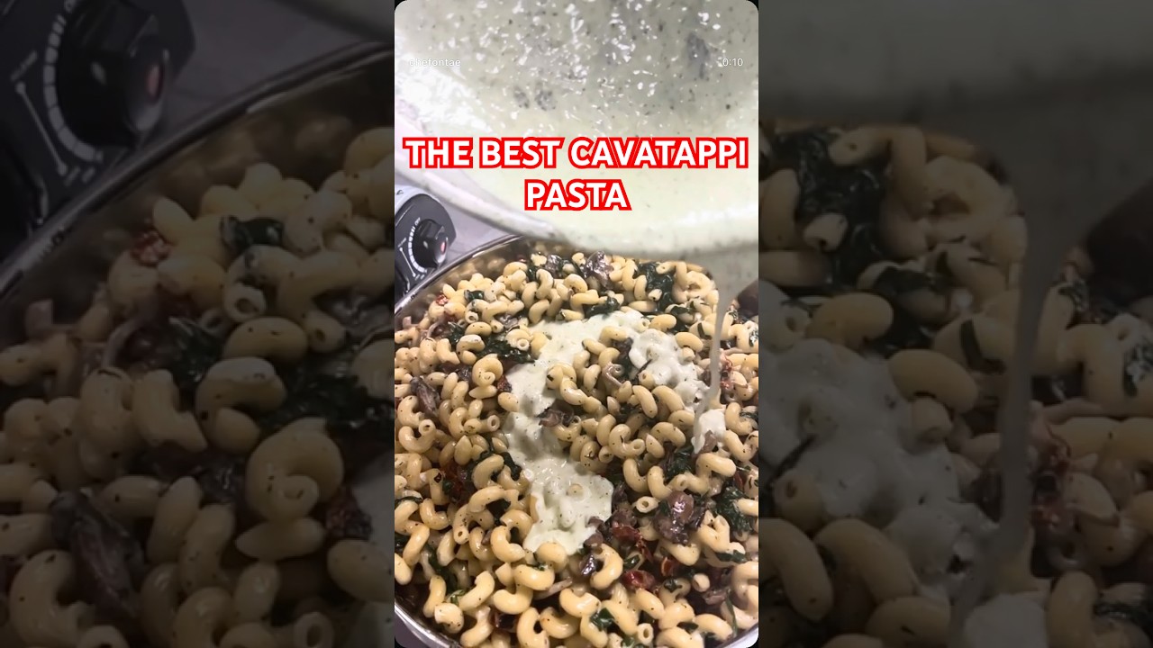 Cavatappi Pasta sauteed spinach sun dried tomatoes wild mushrooms in a pesto cream sauce