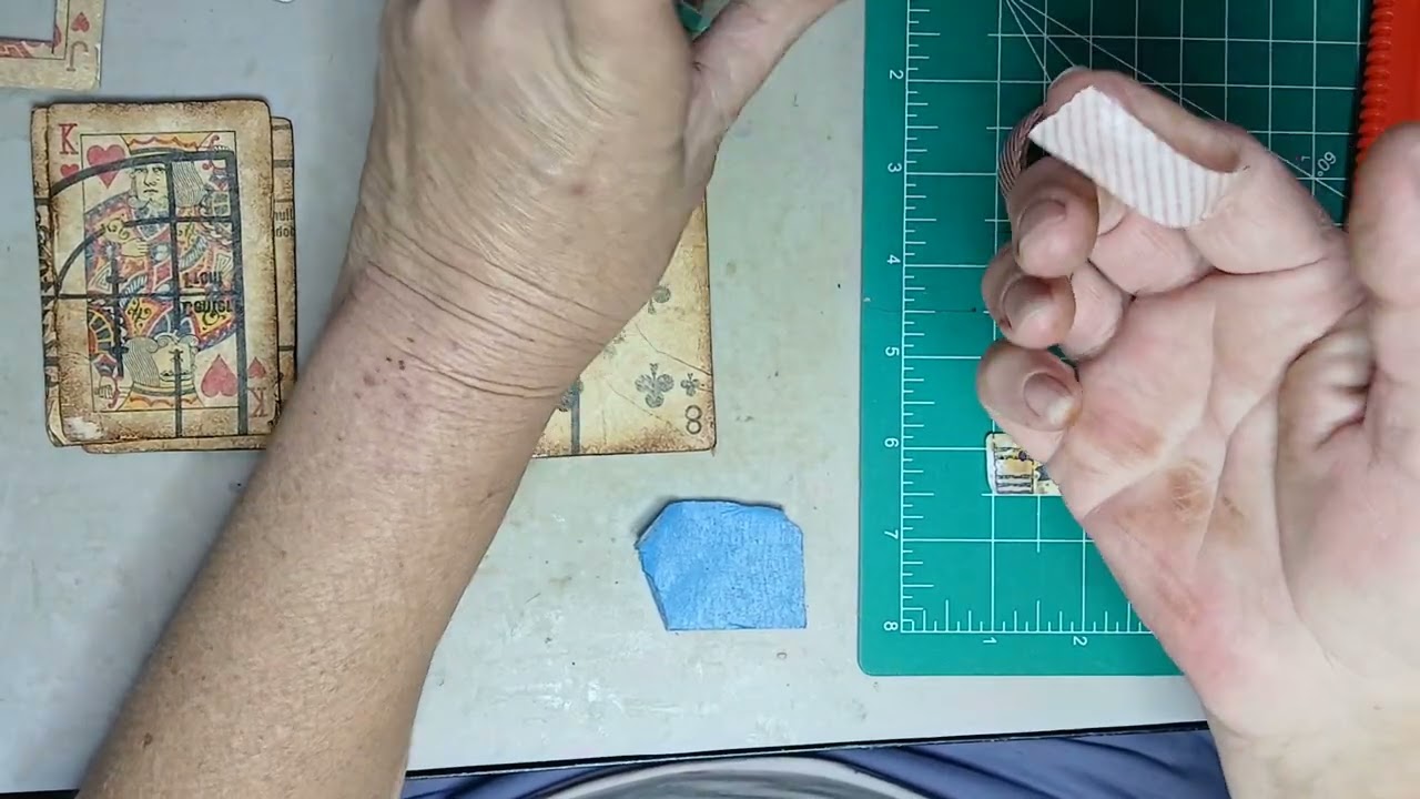 Making a mini playing card book with tab binding