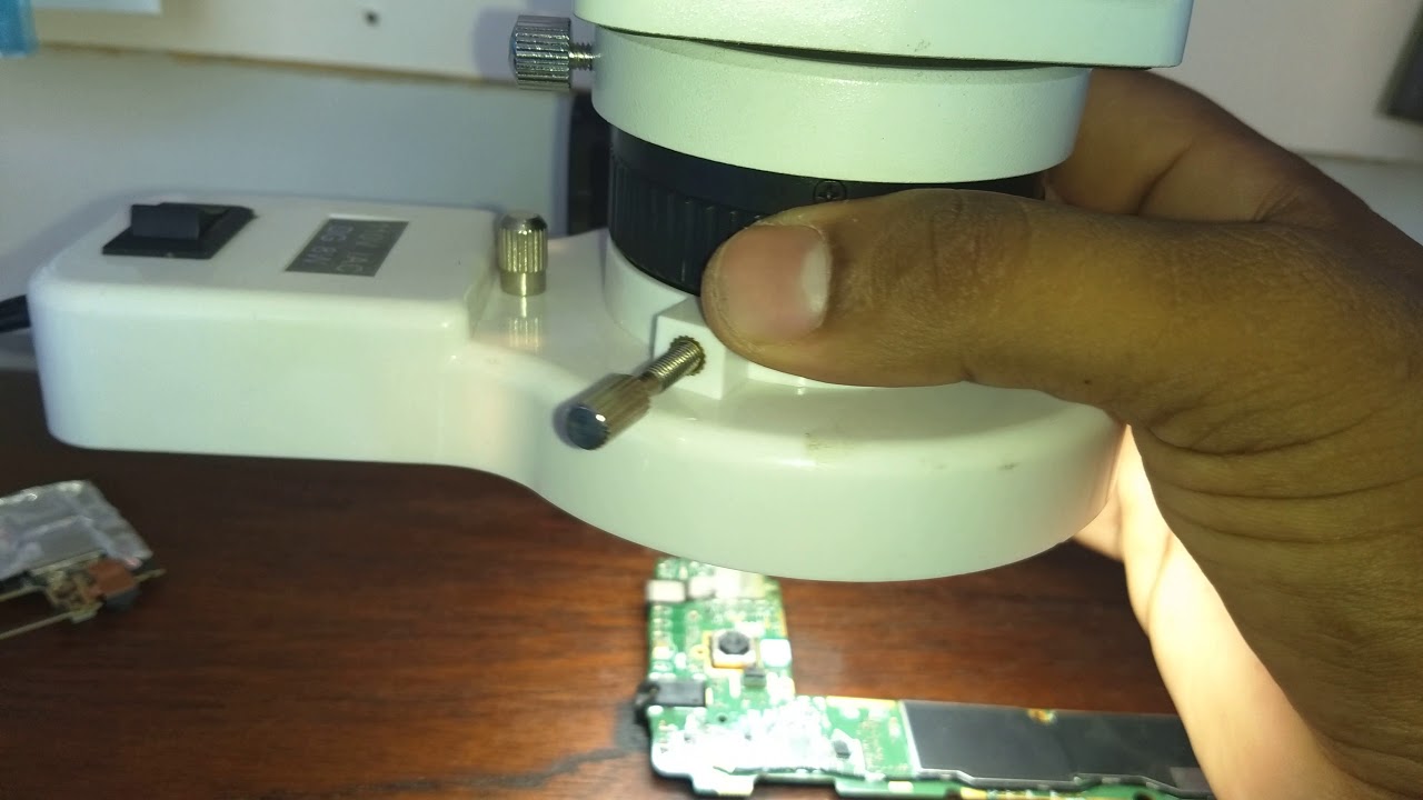 Como regular o microscópio yaxum AK 04