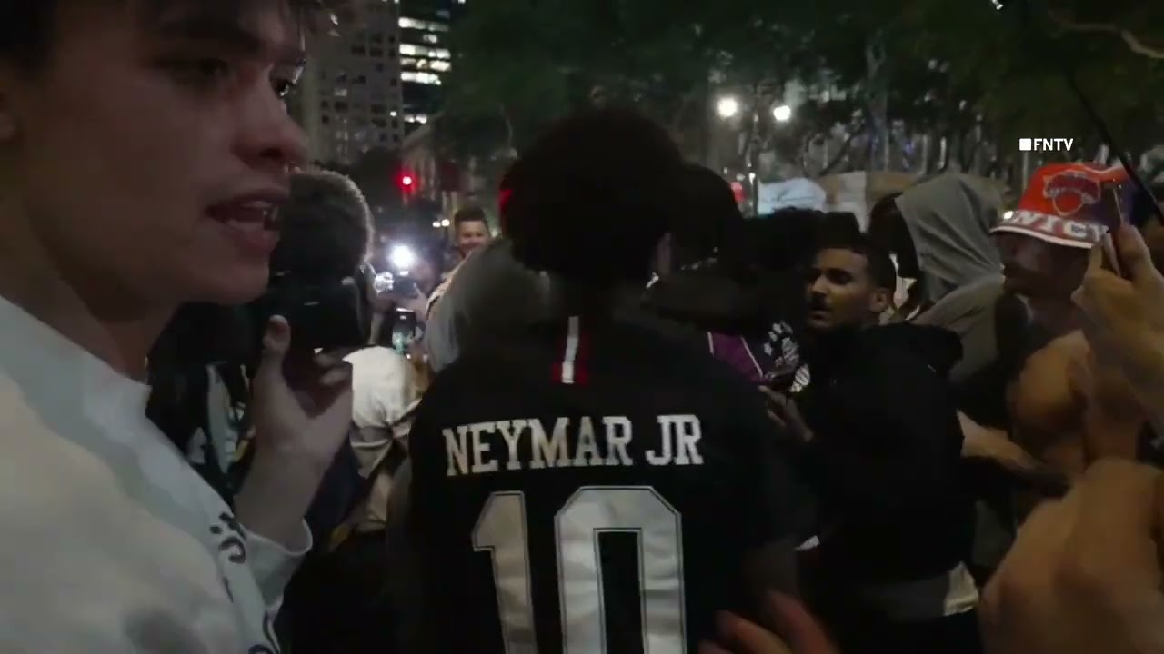 Knicks Fans CLIMB NYPD CARS during NBA Finals watch party outside Bryant Park NYC 6.8.26