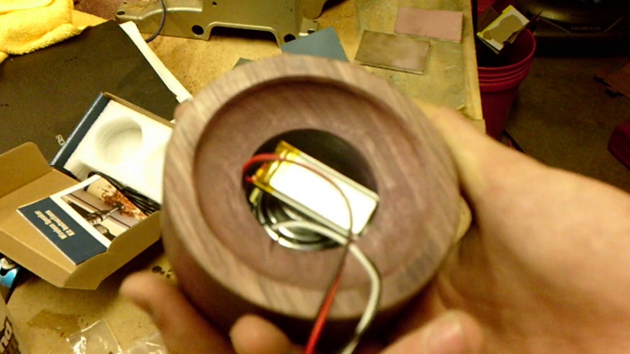 Turning a round Bluetooth speaker.