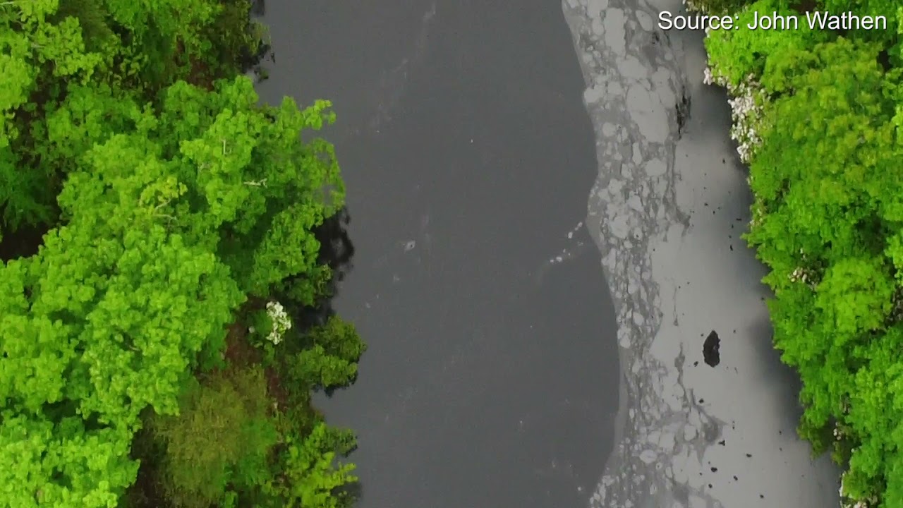 Aerial footage shows polluted water flowing through Texas Creek and Davis Creek
