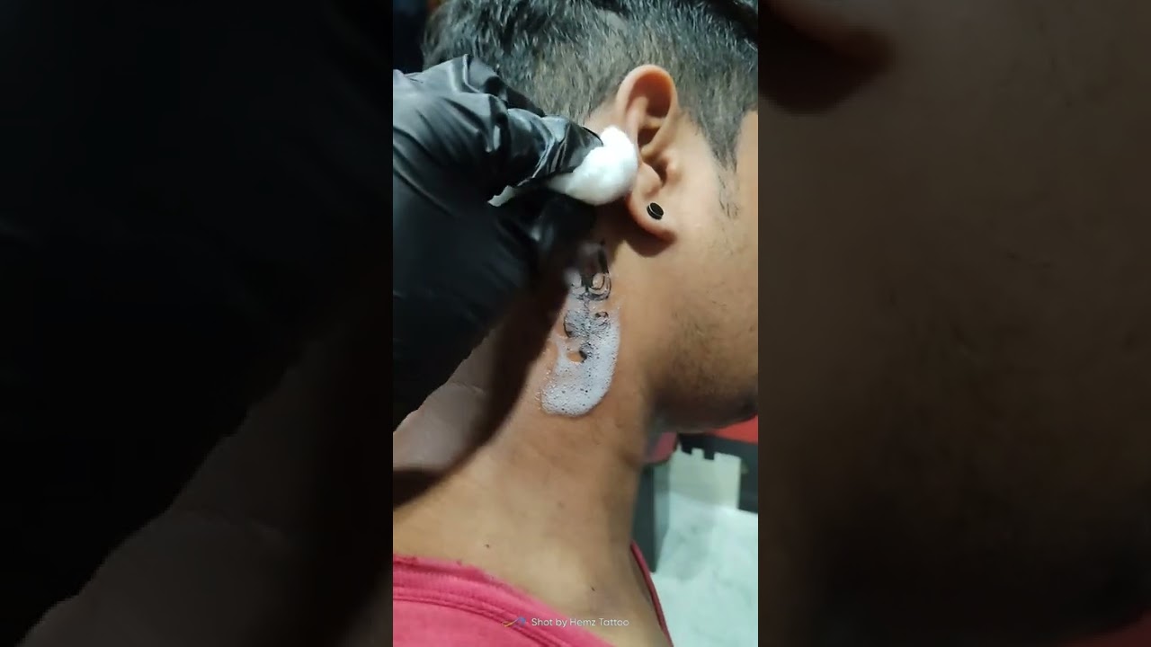 Neck Trishul Tattoo
