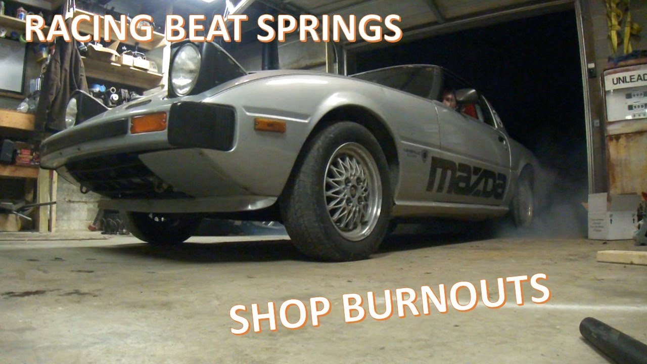 First Gen RX7 Lowering Springs Installed With Camber Plates
