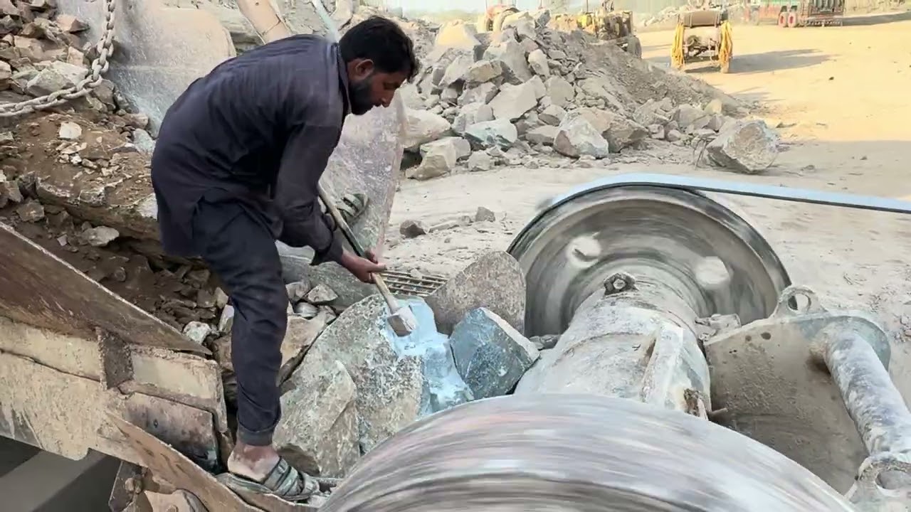 “PLAYING WITH GIANT ROCKS: A GIANT IN ACTION - POWERFUL CRUSHING PROCESS!” 