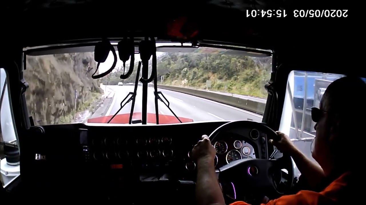 Climbing Mount Ousley in a 409 SAR Kenworth quad dog grossing 57 tons.