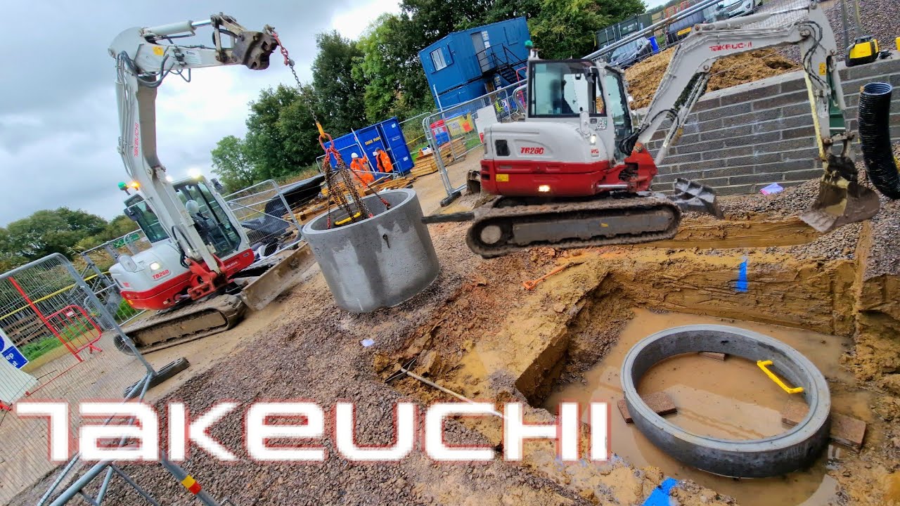 TAKEUCHI MINI DIGGER EXCAVATING FOR A CONCRETE SECTION INSTALL EXCAVATOR JCB CAT VOLVO