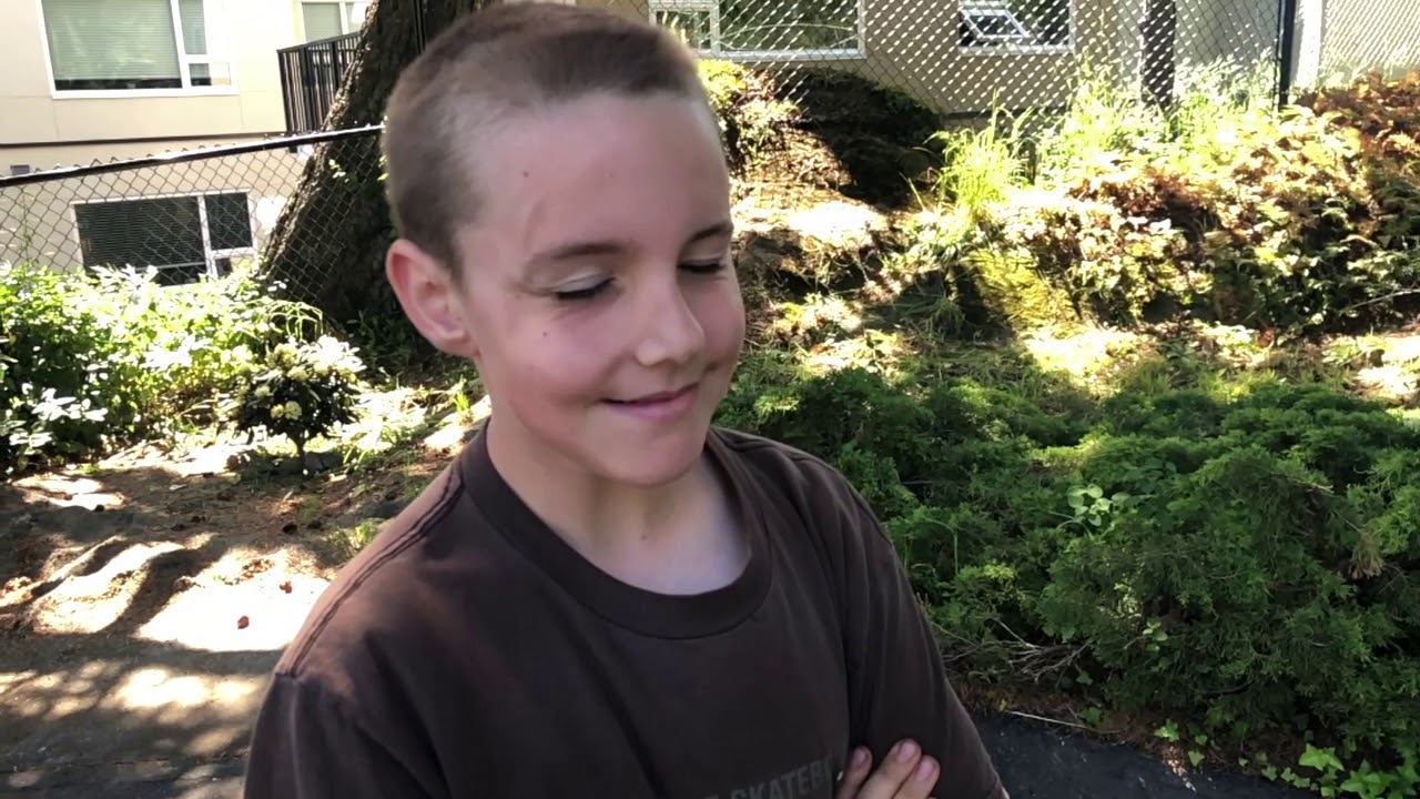 Work fun with blower in slow motion rattles boys face