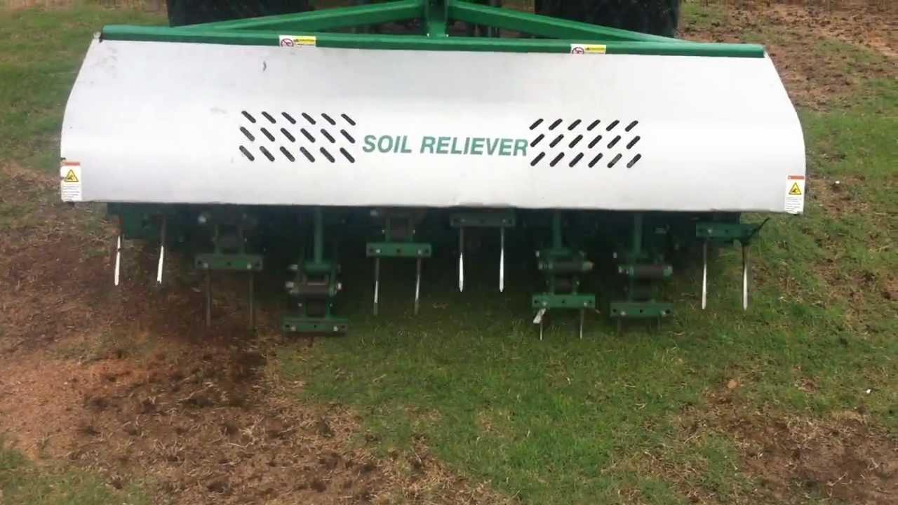Verti-draining a football field