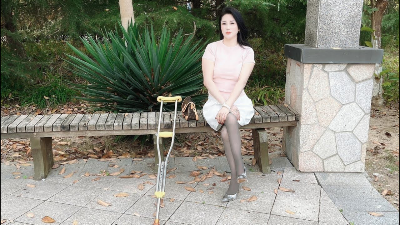 Nancy: Polio Lady's brace and crutch for walking