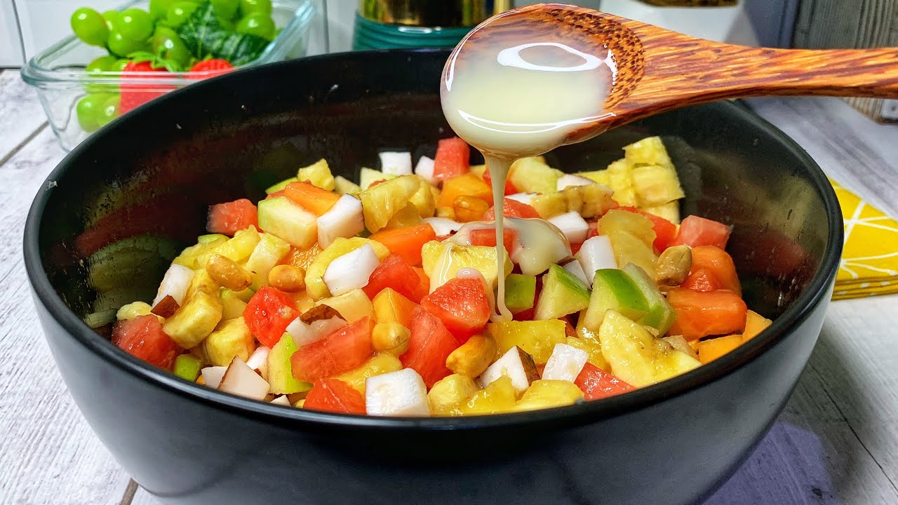 Fruit salad with condensed milk. Very easy recipe