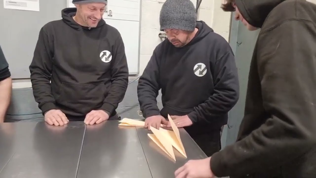 Our team play the paper plane game