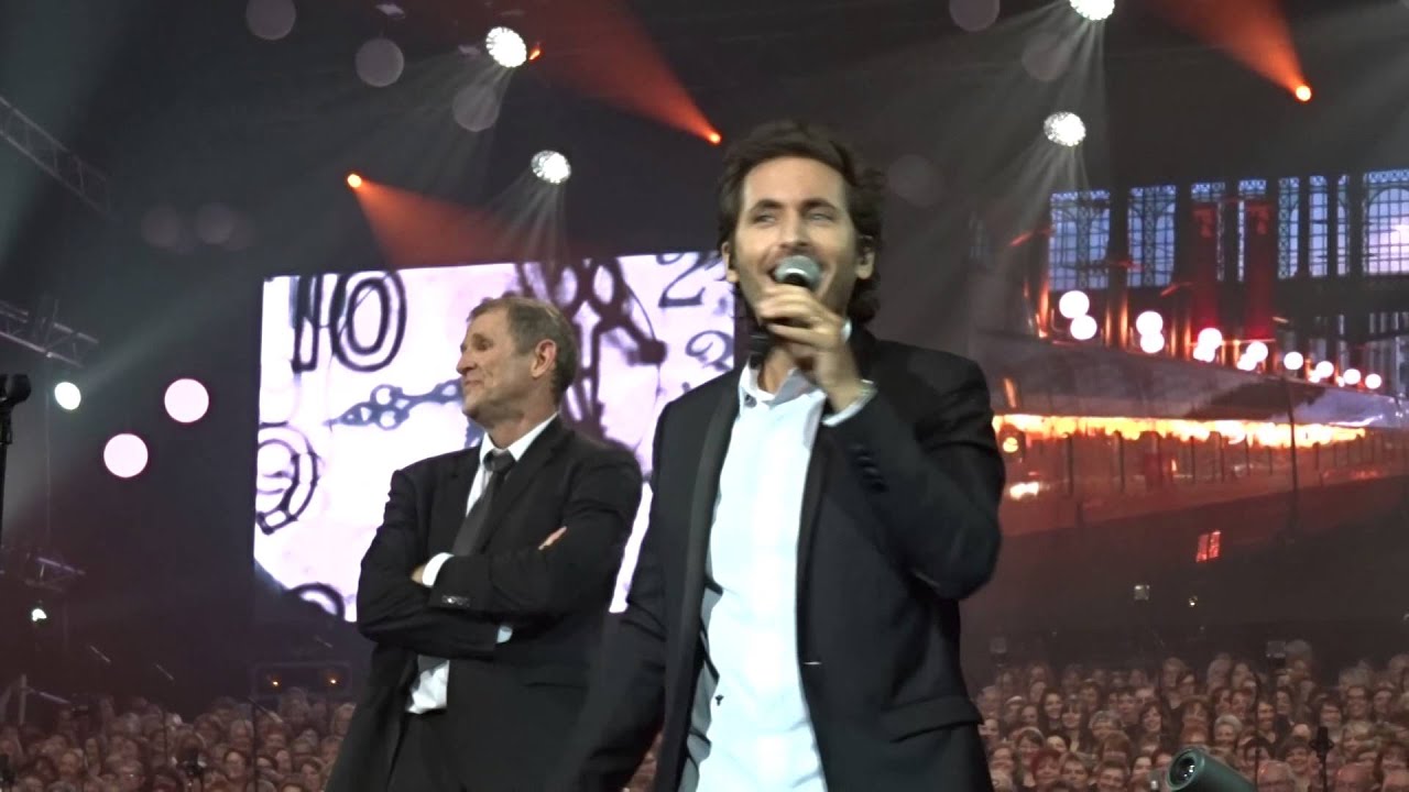 l'horloge tourne avec 2000 choristes et Mickaël Miro