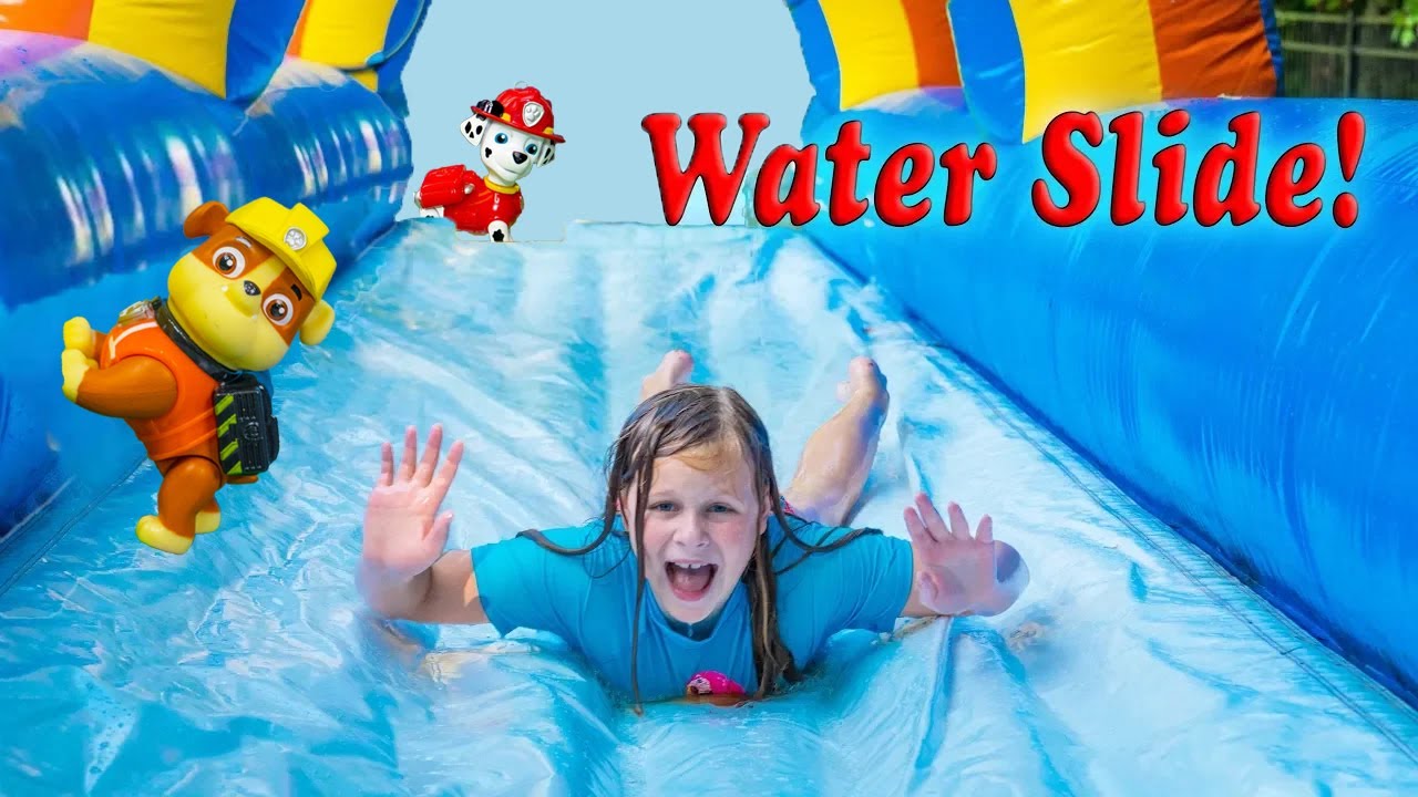 Assistant and Paw Patrol have Inflatable Bounce House Slip n Slide fun