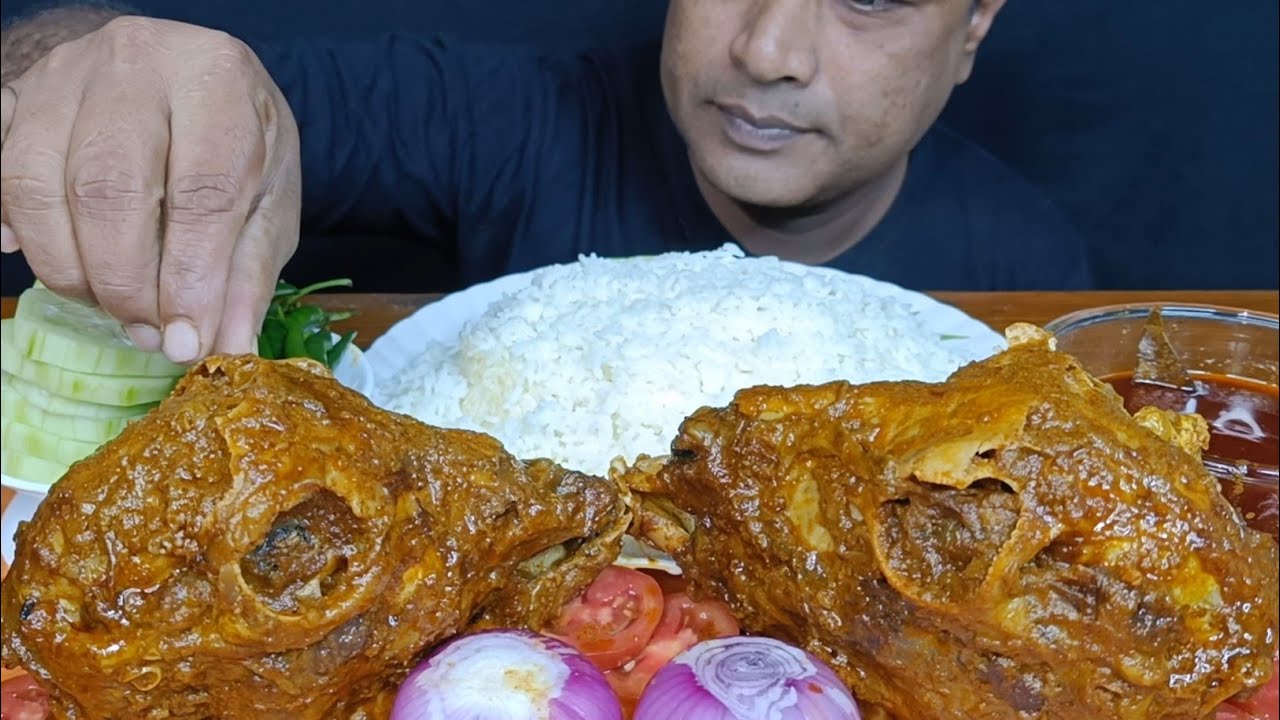 EATING TWO PIECE WHOLE GOAT HEAD CURRY, WHITE RICE, EXTRA GRAVY AND SALAD, EATING SHOW