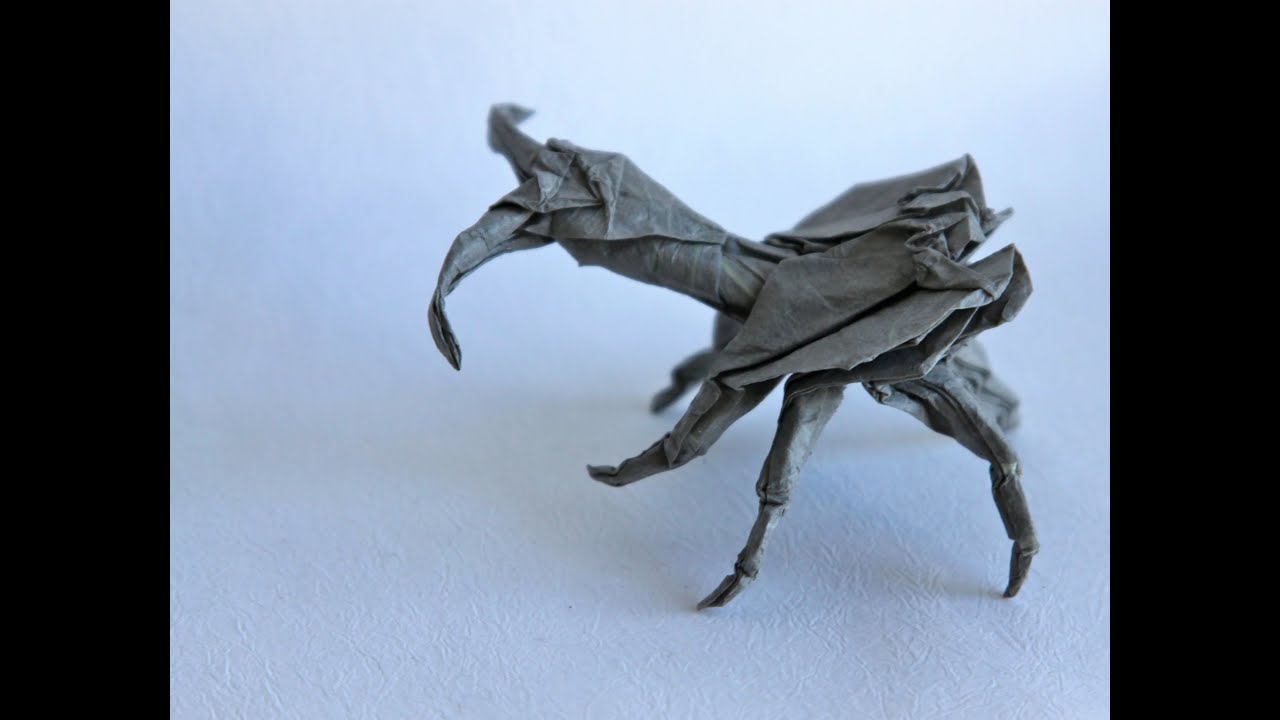 Origami violin beetle by Manuel Sirgo