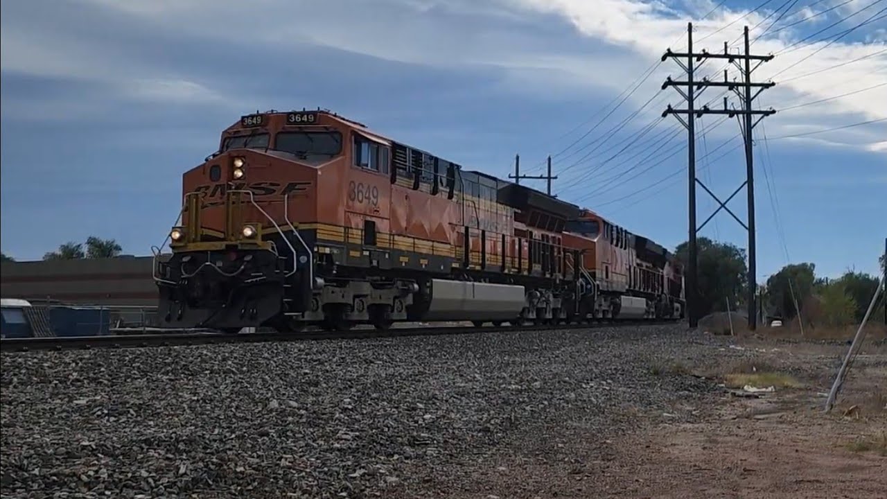 BNSF 3649 leads a NB empty company coal train in the Springs!