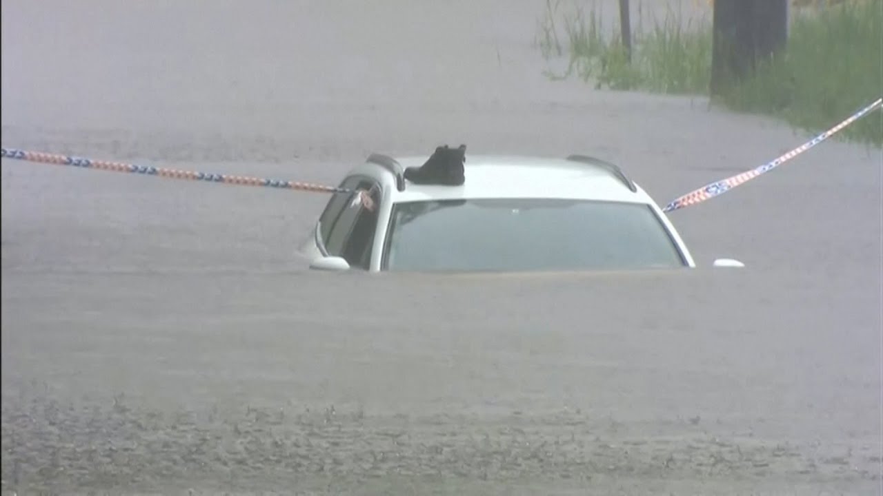 Australia hit by torrential rain and flash floods after months of bush fires