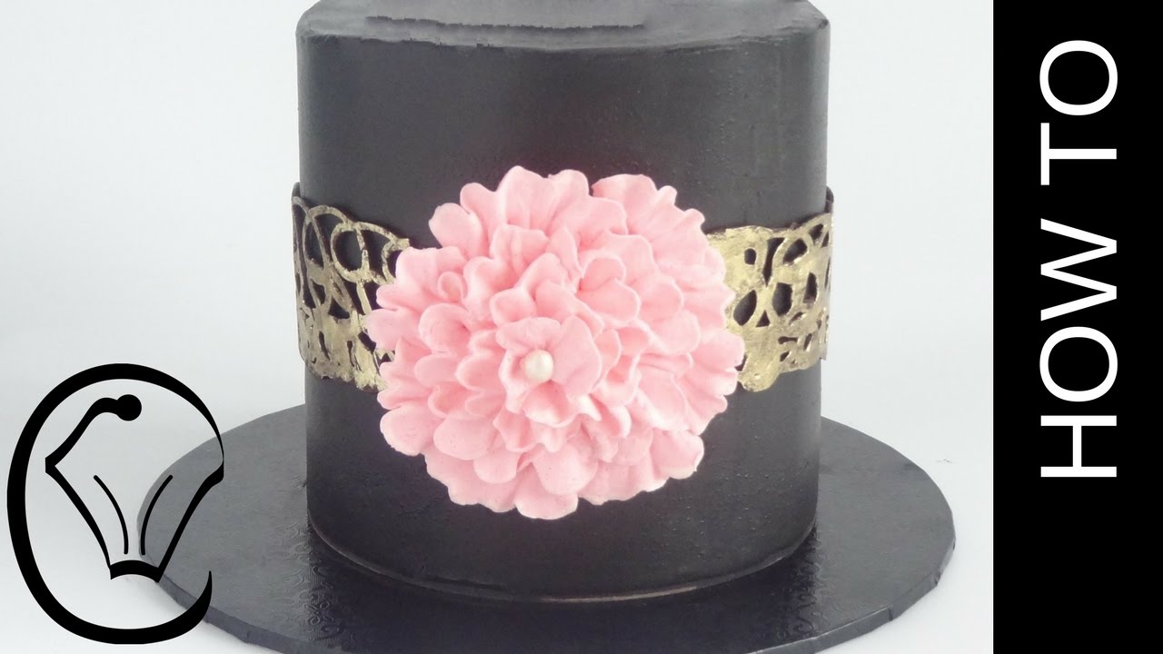 Black Chocolate Ganache Cake with Gold Chocolate Collar and Buttercream Flower