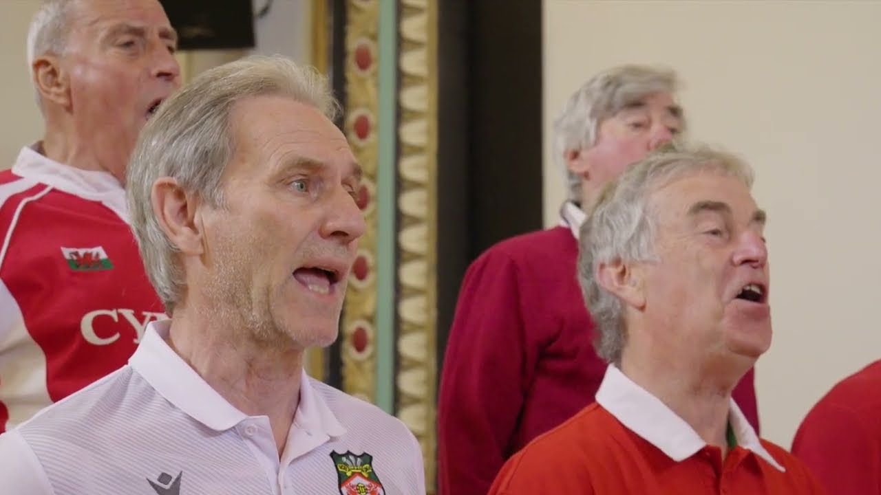 Wrexham is the name / Here they come the mighty Champions - Rhos Male Voice Choir