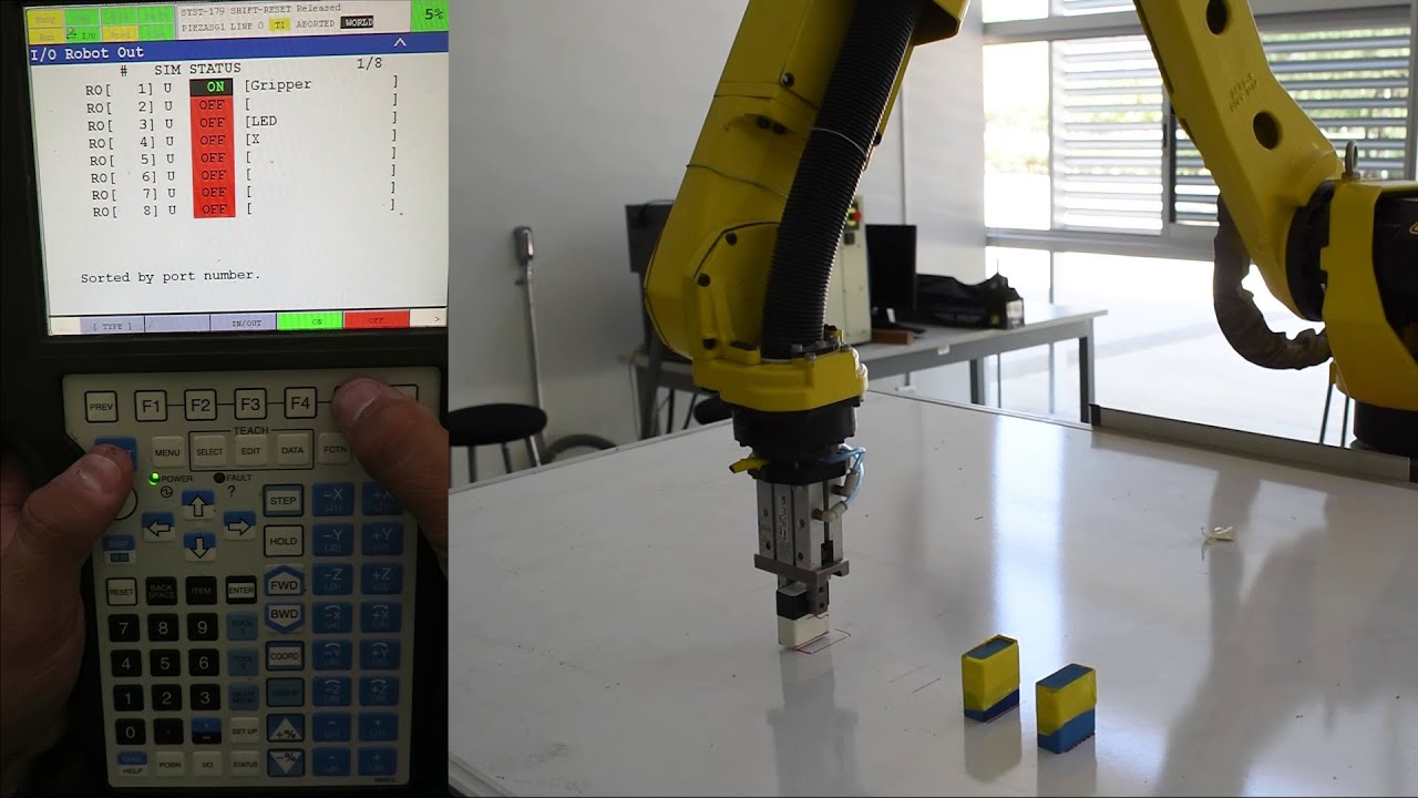 Programación a nivel básico del robot Fanuc M10-iA con entradas y salidas (RI/RO, wait, call).