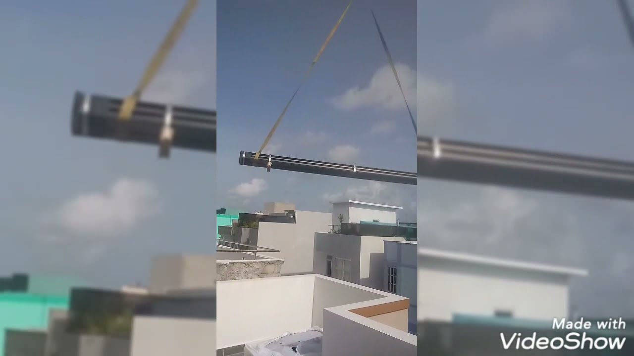 how to Laying 19 feet long 1000 kg iron bar on the top floor of the building