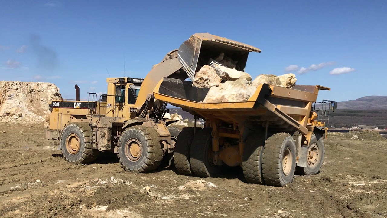 Caterpillar 988F Wheel Loader Loading Dumpers With Stones - Labrianidis Mining Works