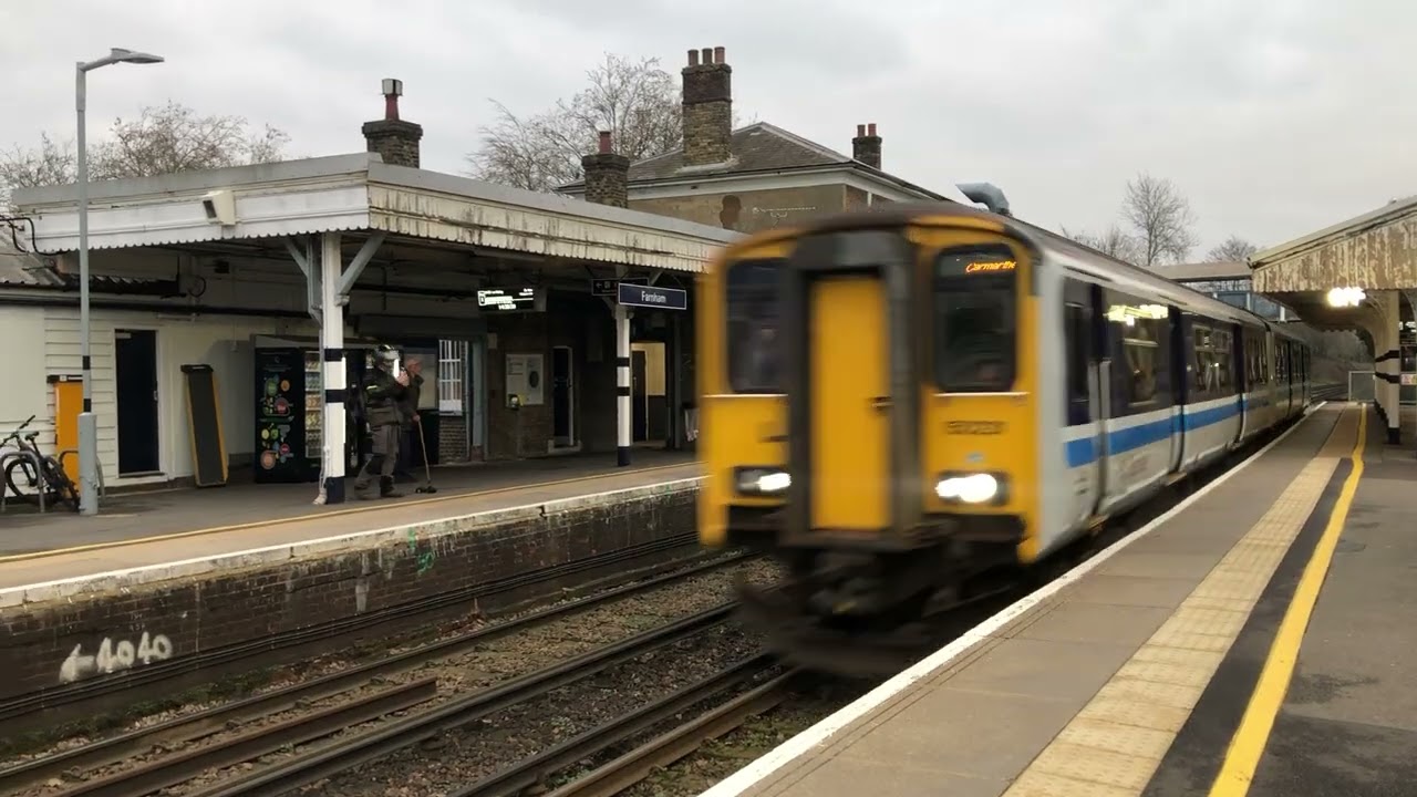 Regional railways class 150 231 passes through Farnham on its way to the Watercress Line (23/12/25).
